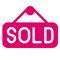 pink sold sign