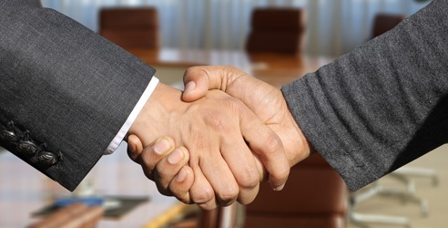 hand shake for bridging loan brokers